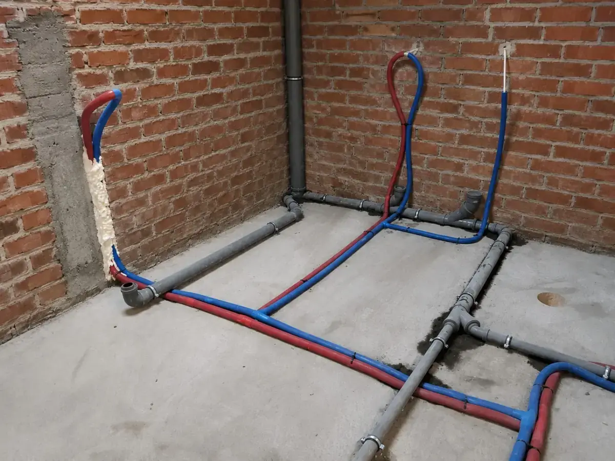 First-fix internal drainage and water services on a concrete floor